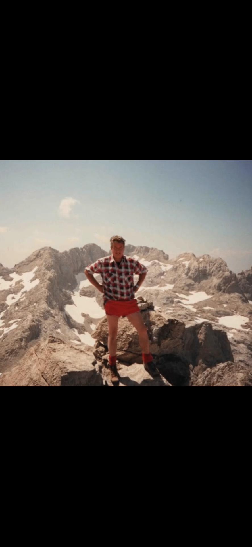 Atop a snowy mountain peak in the European ranges